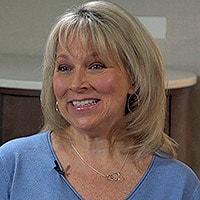 photo of Lisa Scace Dosier